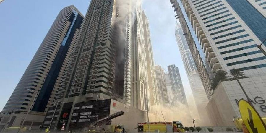 حصري فقط على تواصل نيوز - الدفاع المدني في دبي أخمد حريق برج المارينا وقام بإخلاء 3820 شخصاً - تواصل نيوز